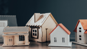 Multiple toy houses on a table