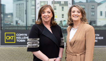 Debbie Moore and Patrice O'Keeffe outside Comyn Kelleher Tobin's Office